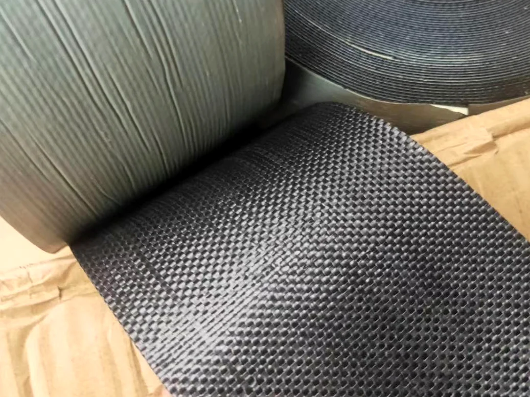 Real PP mesh reinforced tape close-up with woven black surface texture